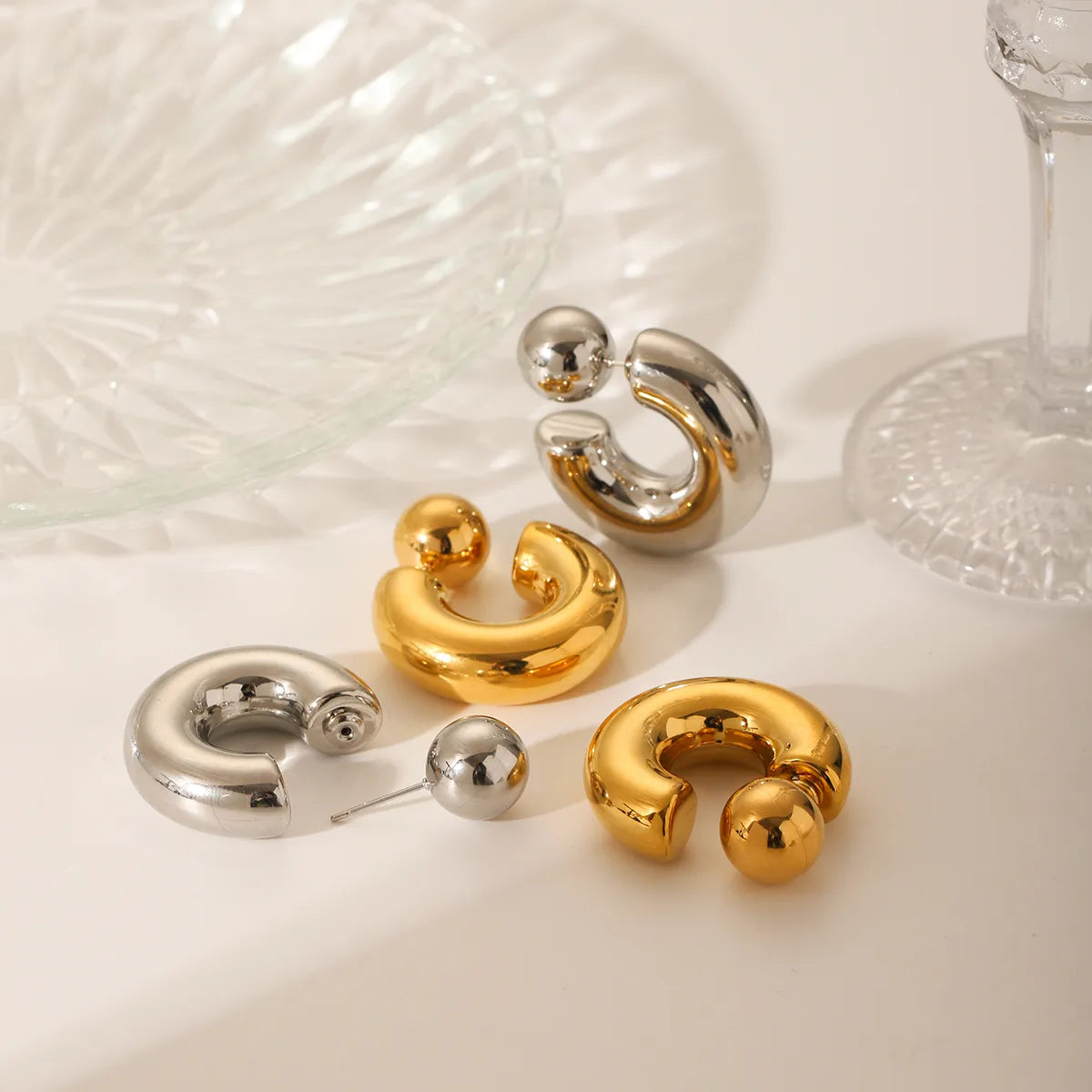 Artistic Gold and Silver Ear Studs