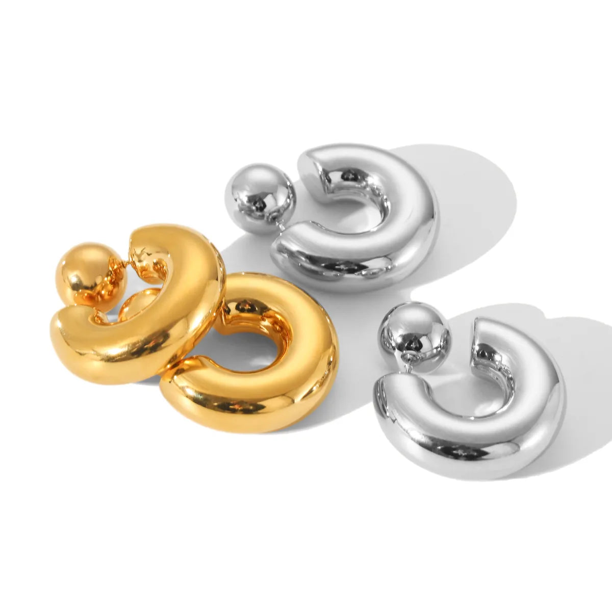 Artistic Gold and Silver Ear Studs