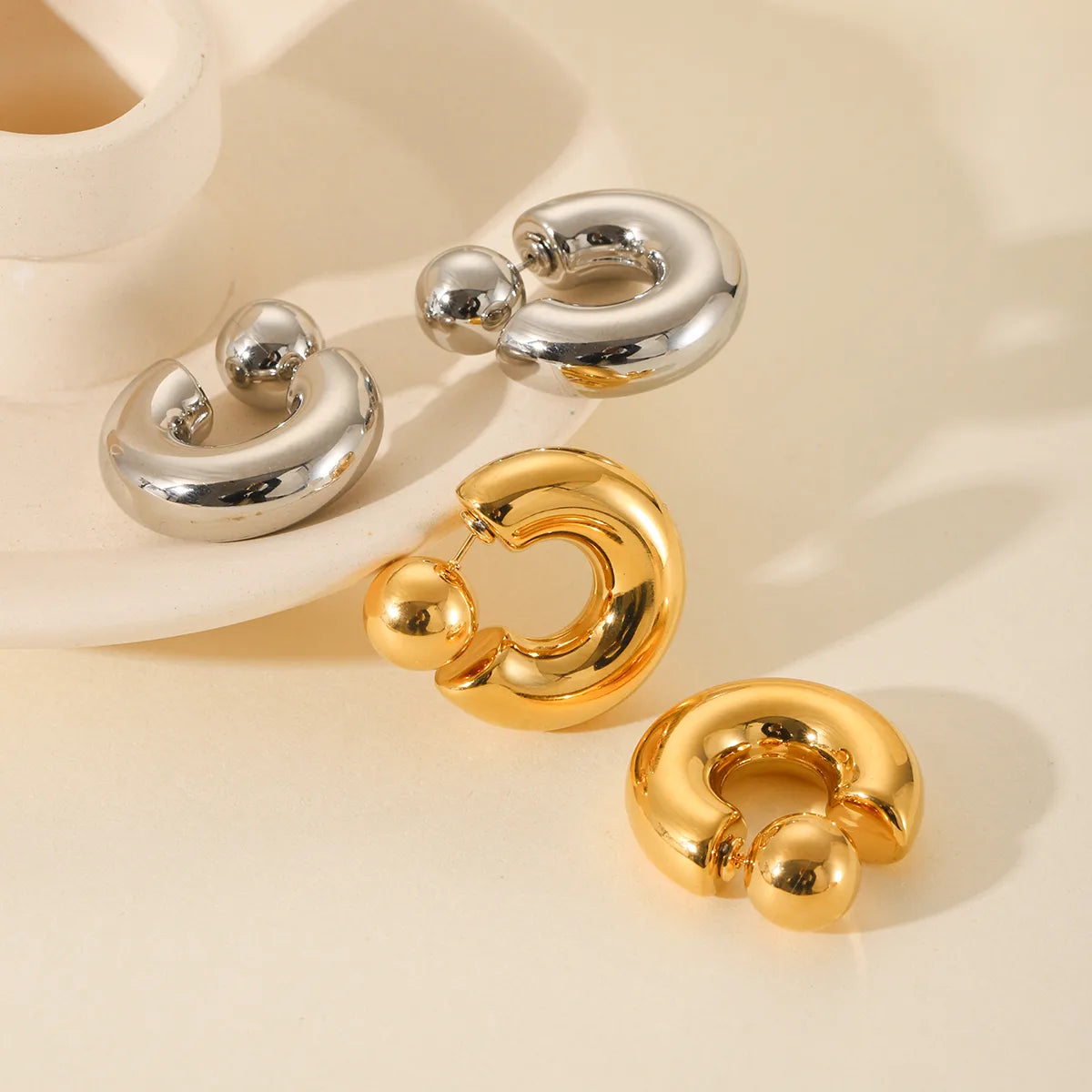 Artistic Gold and Silver Ear Studs