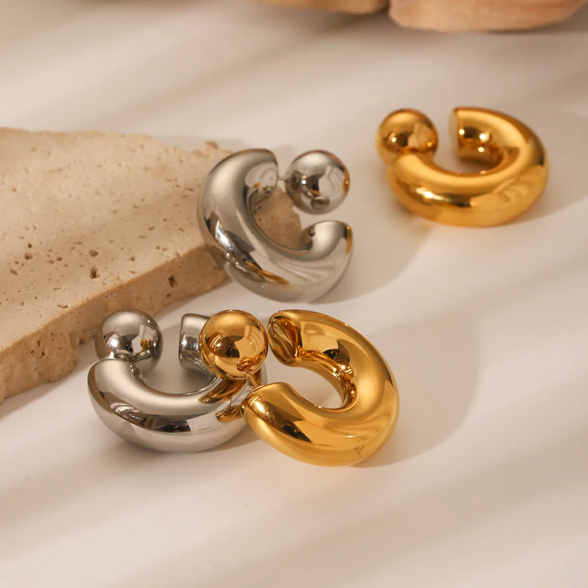 Artistic Gold and Silver Ear Studs